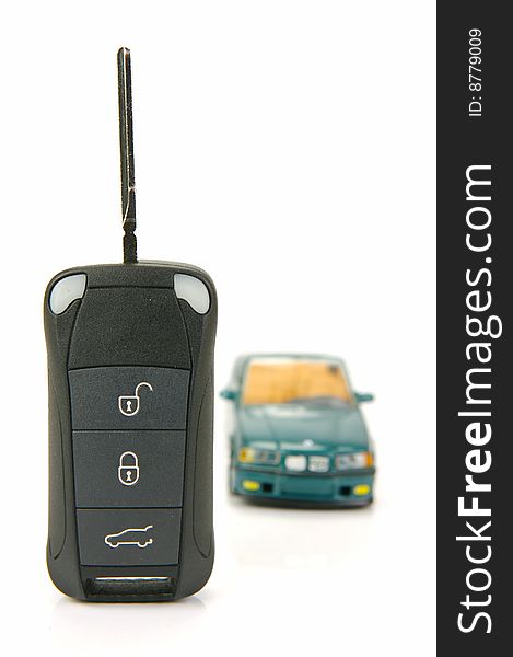 Modern car key isolated against a white background