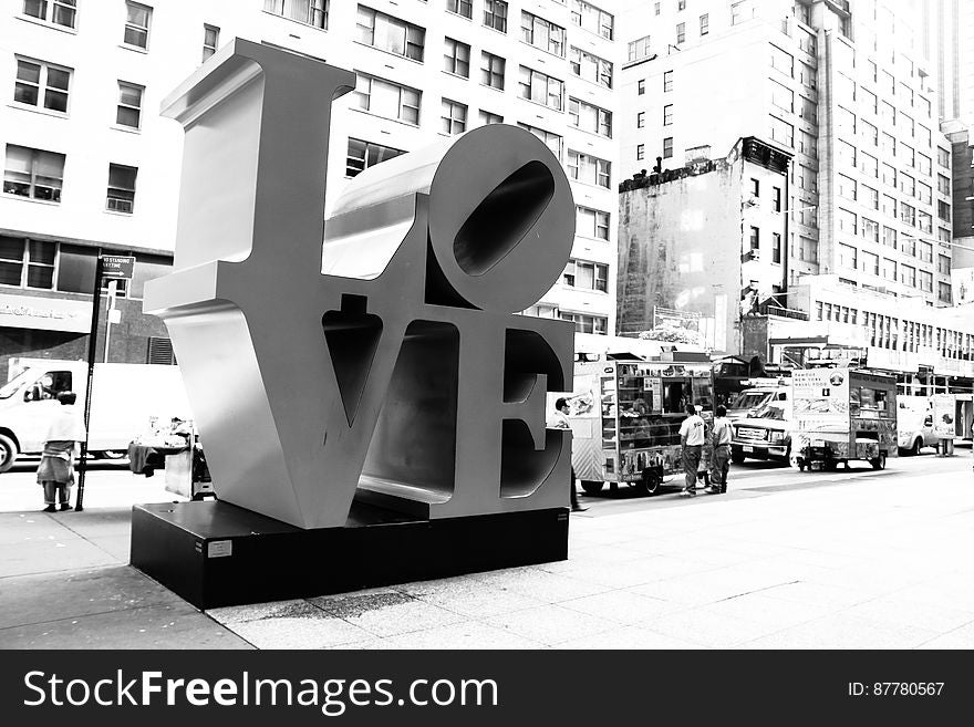 LOVE sculpture by Robert Indiana on the corner of 6th Avenue and 55th Street in Manhattan, NY.
