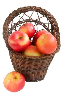 Wicker Basket With Red Apples. Stock Image