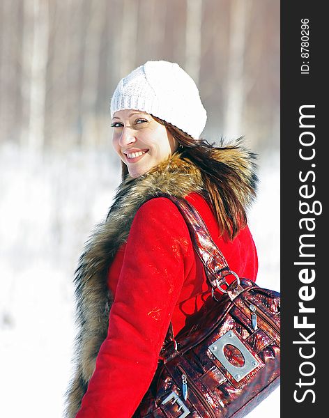 A portrait of young pretty woman in winter outwear. A portrait of young pretty woman in winter outwear