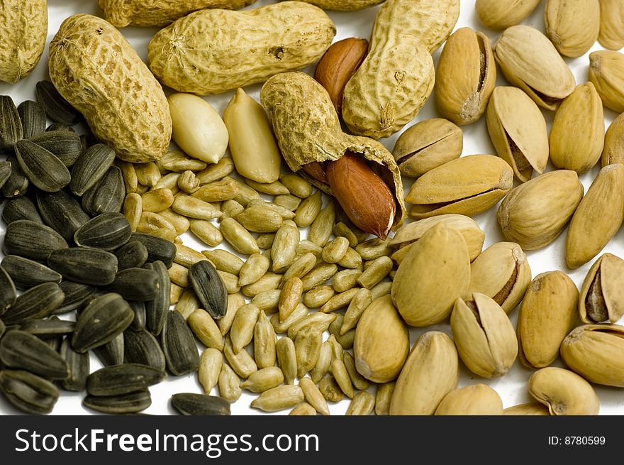 Nuts and seeds on a white background