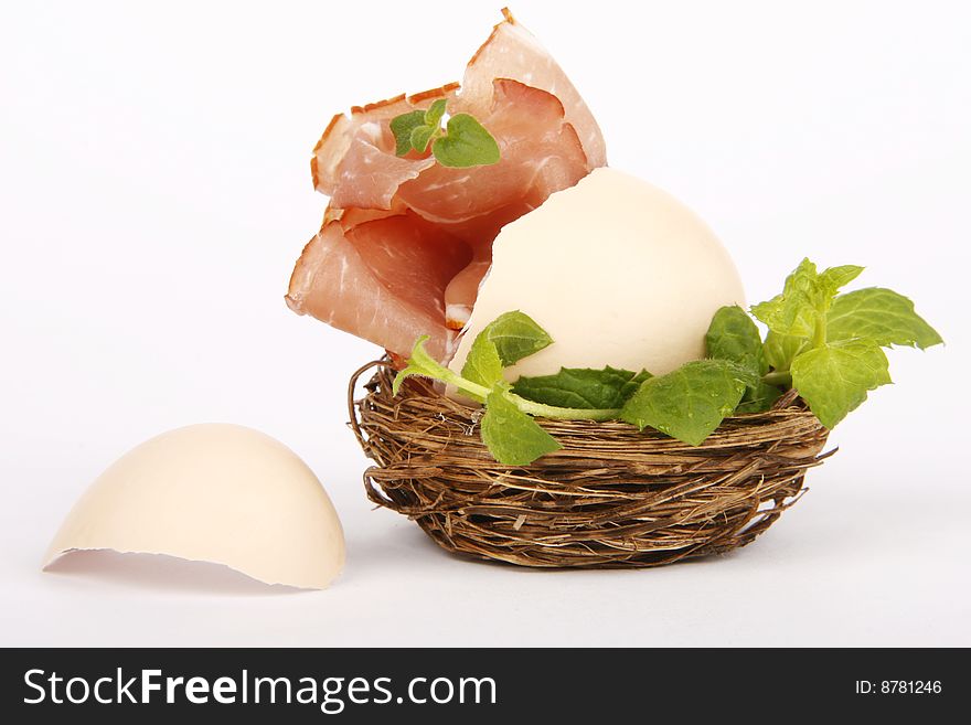 Easter egg with ham and herbs