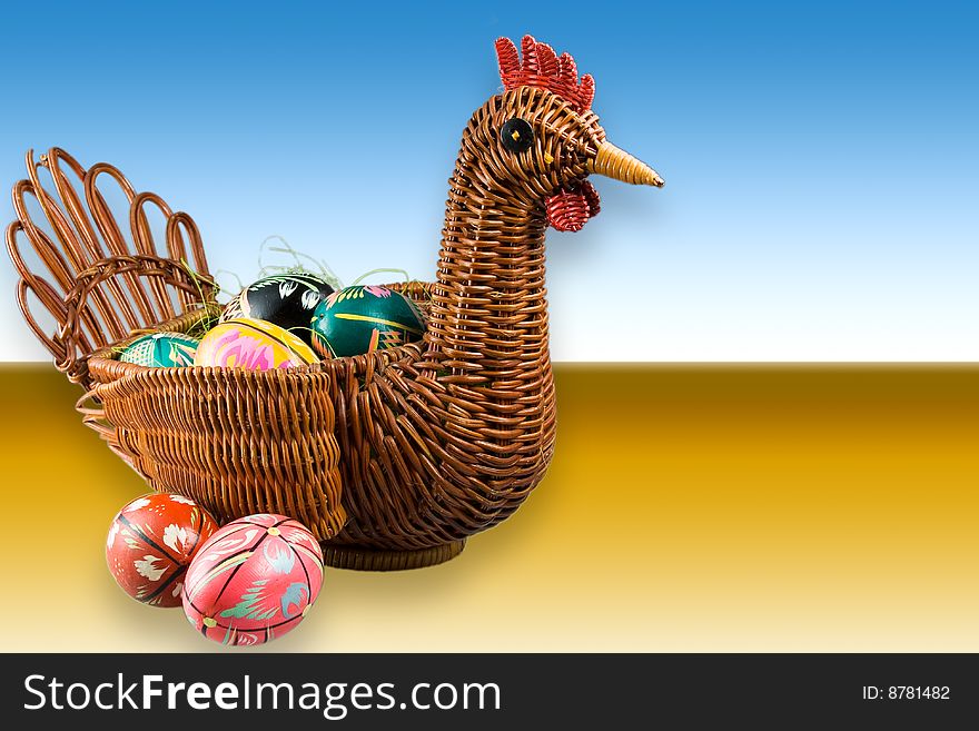 Easter eggs in a basket in the form of a hen