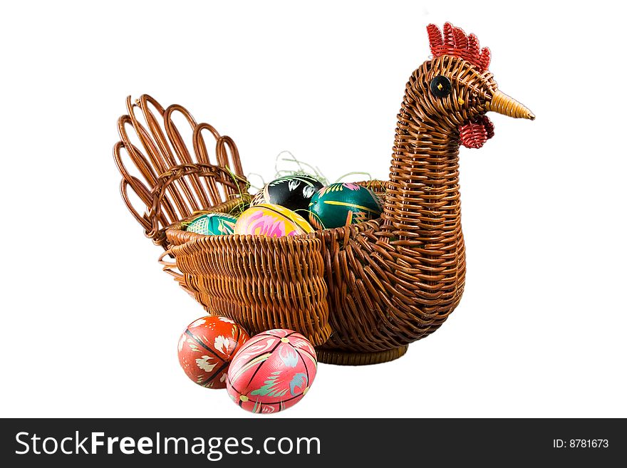 Easter eggs in a basket in the form of a hen