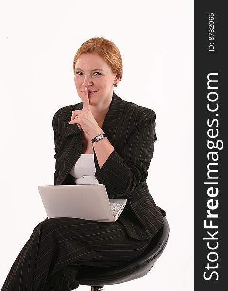 Silent woman with notebook sitting on chair