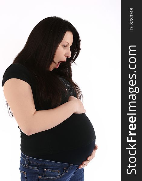 Profile of young pregnant woman with stare