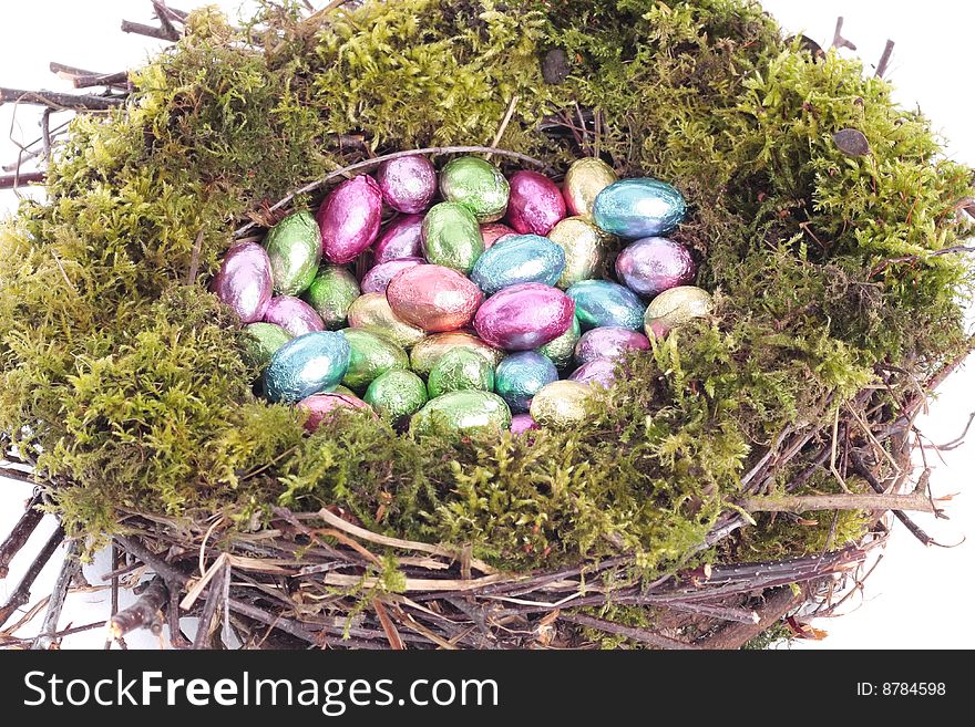 Easter eggs  in bird nest closeup. Easter eggs  in bird nest closeup