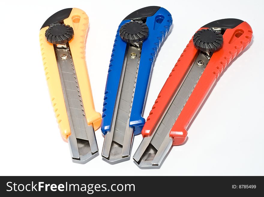 Three paperknifes,red,blue and yellow