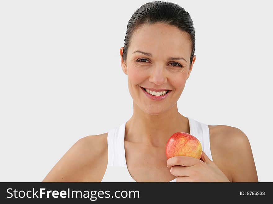 Portrait of a young caucasian woman holding an apple. Portrait of a young caucasian woman holding an apple