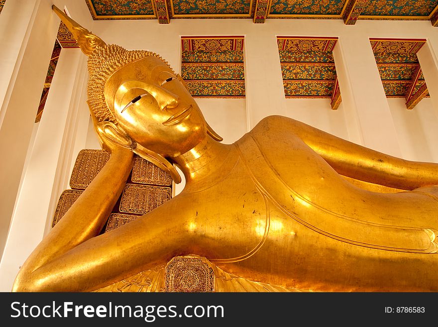 The reclining Buddha image of Wat Rat-orot, Bangkok,Thailand. The reclining Buddha image of Wat Rat-orot, Bangkok,Thailand