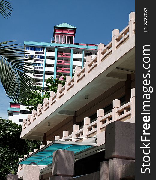 A colourful building and railing