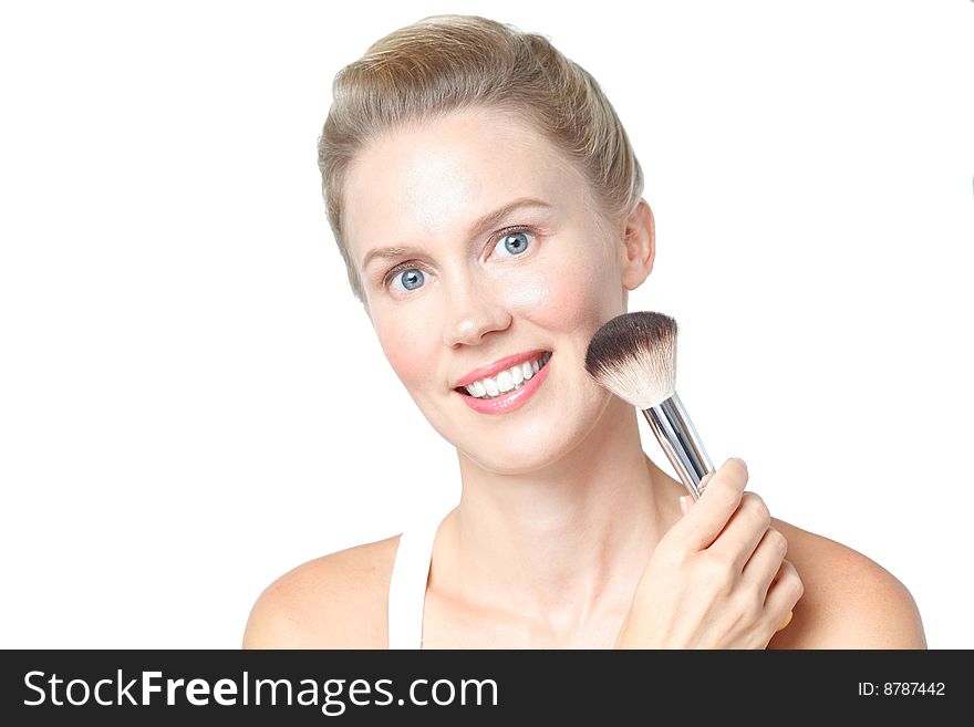 Beauty shot of blonde Caucasian woman holding smiling and looking into camera isolated in white. Beauty shot of blonde Caucasian woman holding smiling and looking into camera isolated in white.