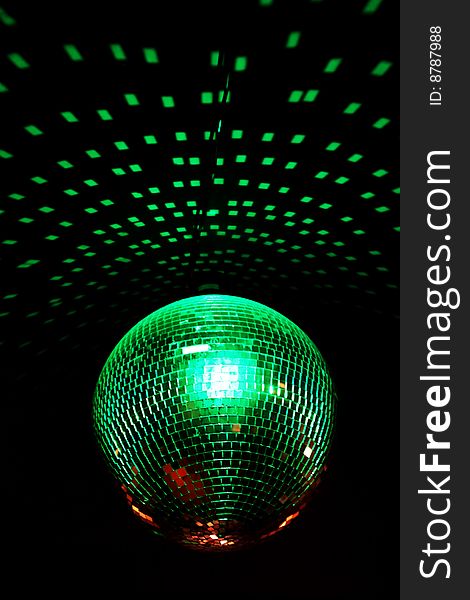 Color lighting disco mirror ball in dark room