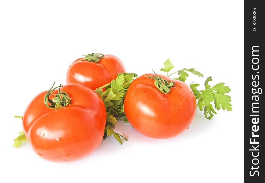 Tree red tomatoes on white background. Tree red tomatoes on white background