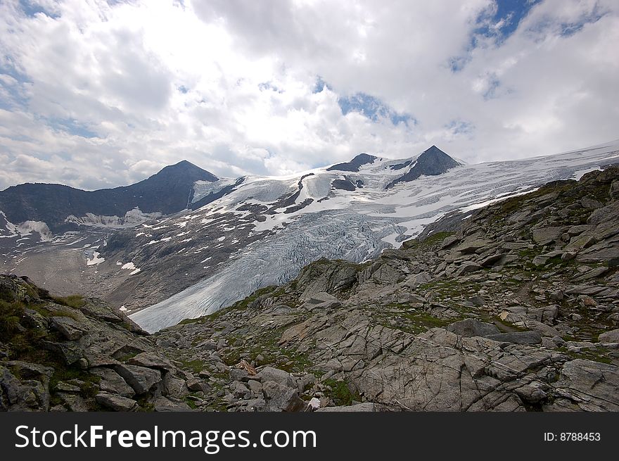 High mountain and glacier with cracks. High mountain and glacier with cracks