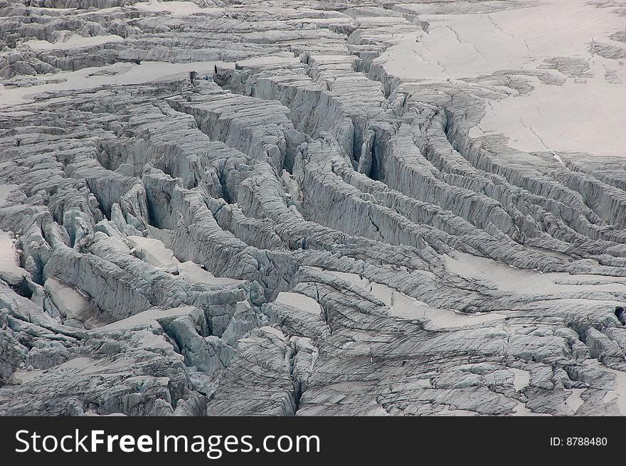 High mountain and glacier with cracks. High mountain and glacier with cracks