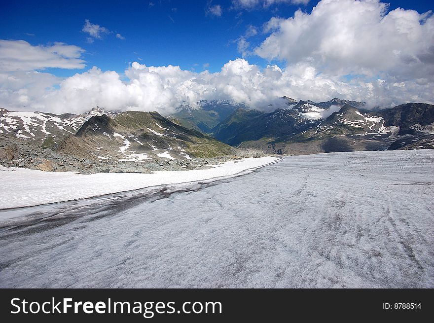 High mountain and glacier with cracks. High mountain and glacier with cracks