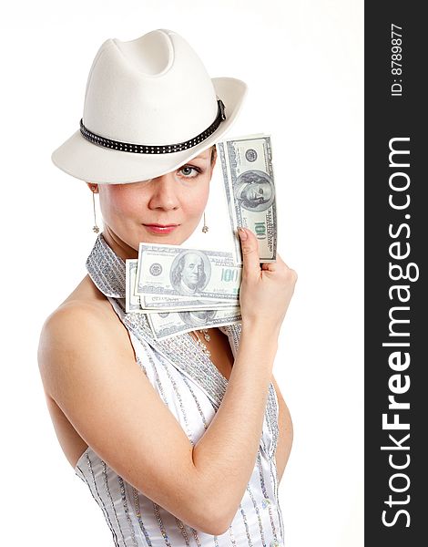 Young pretty woman in white hat and striped suit with money in hand