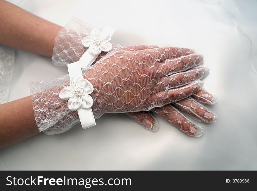 Hands of young bride on the evening dress. Hands of young bride on the evening dress