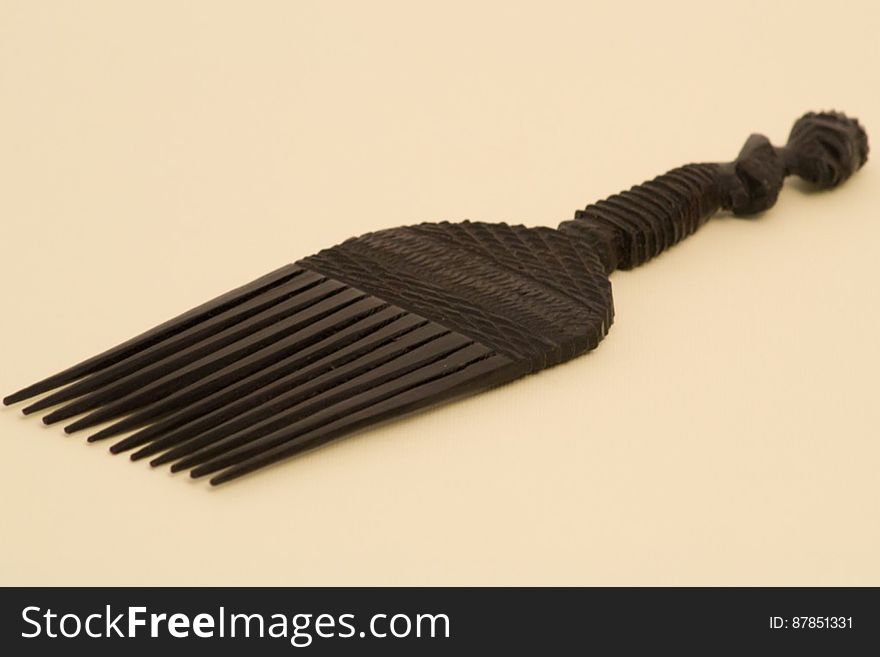 african-hand-made-black-wooden-comb