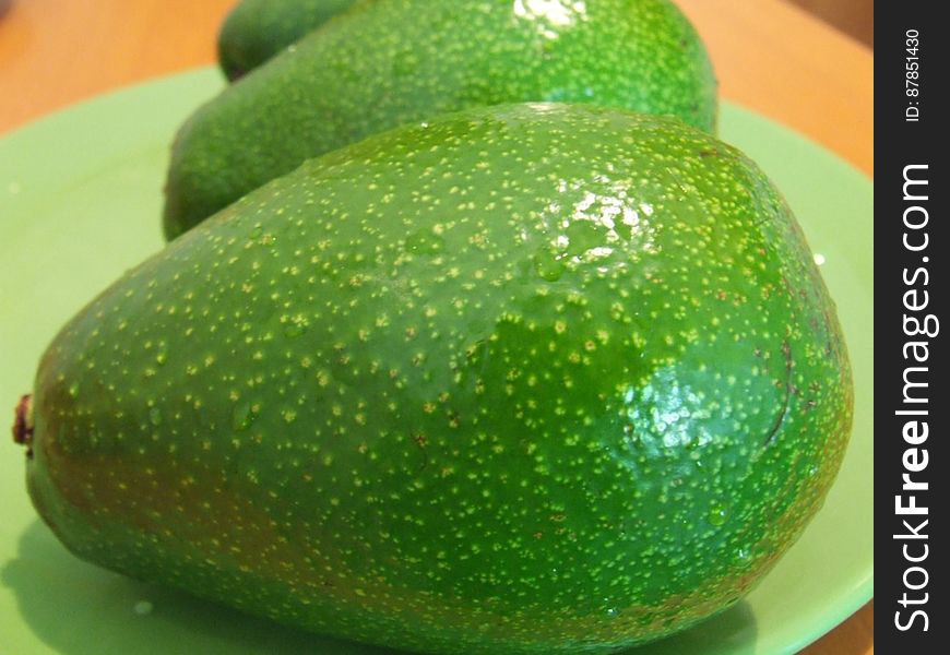 avocados-on-green-plate