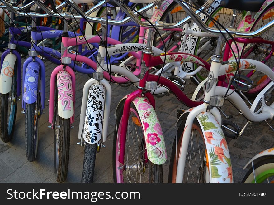artistic-painted-parked-bicycles