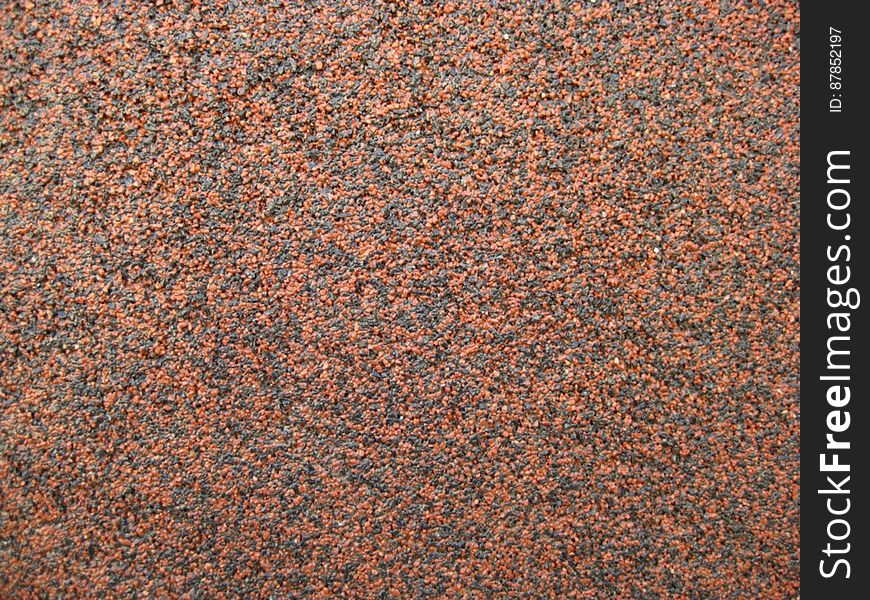 black-and-orange-mineral-sand-texture