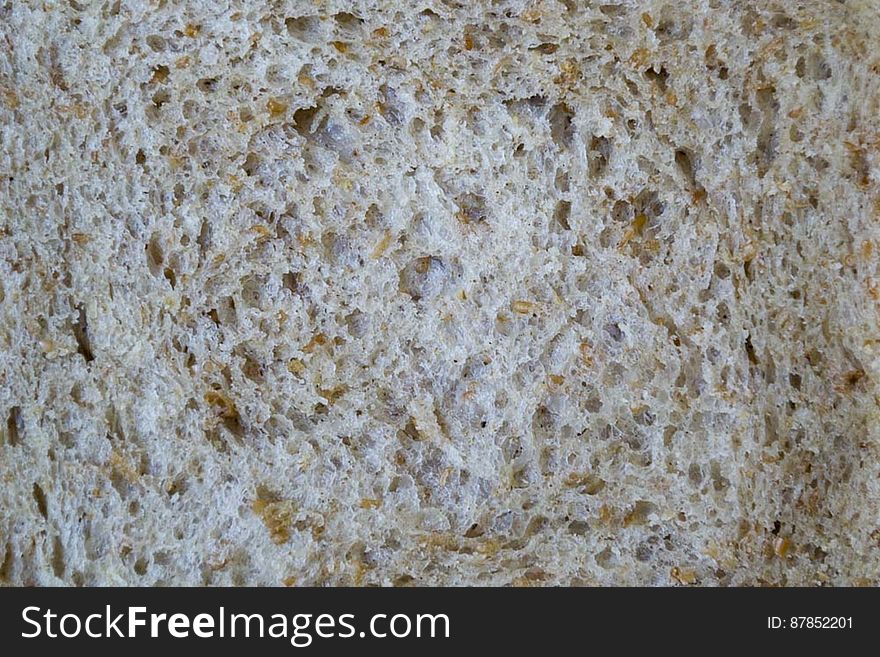 Texture of an ecologic multi-grain bread slice. Texture of an ecologic multi-grain bread slice.