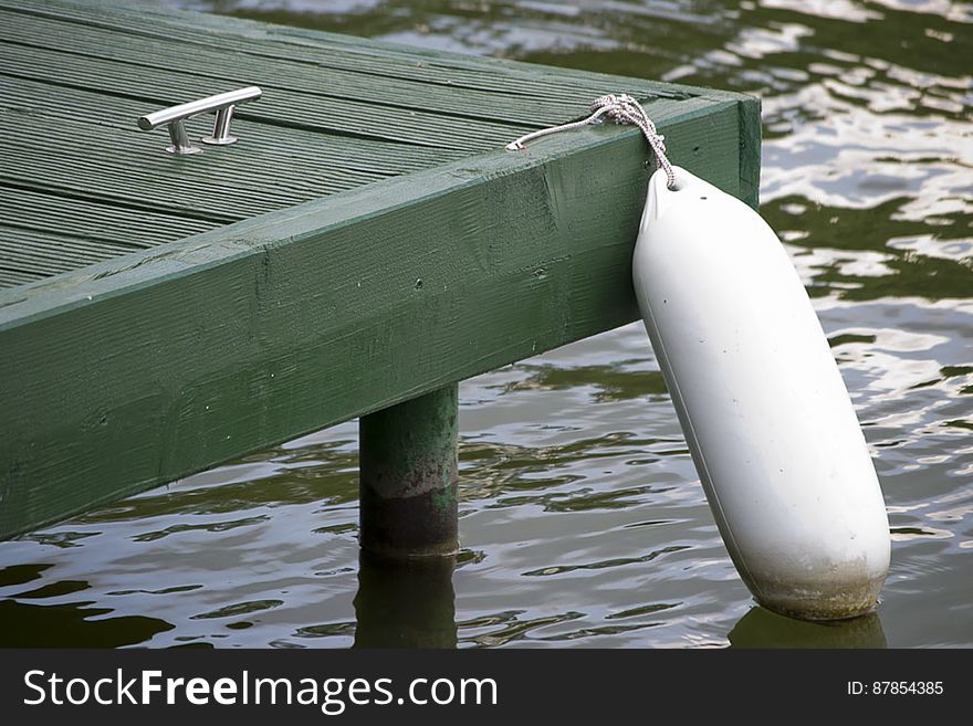 White buoy on side of pontoon. White buoy on side of pontoon
