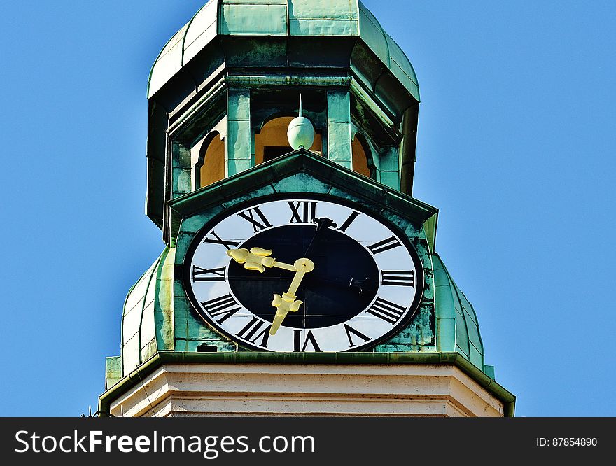 Tower Clock Under Blue Sky During Daytime