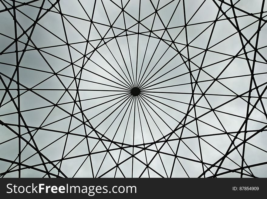 Glass roof with geometric pattern mettalic frame.