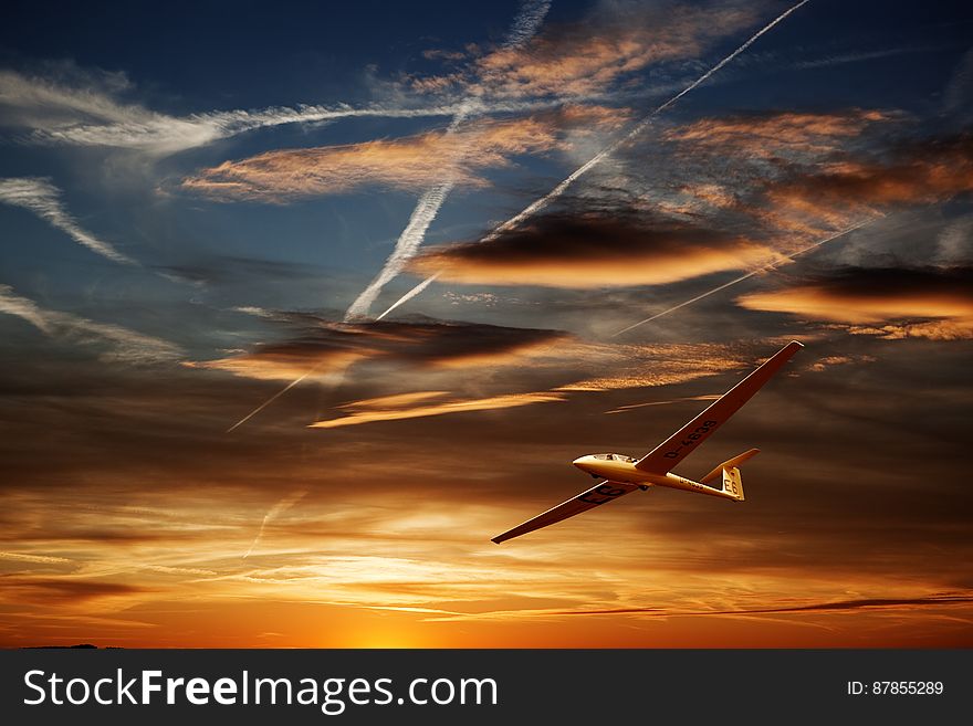 Airplane On Air During Golden Hour