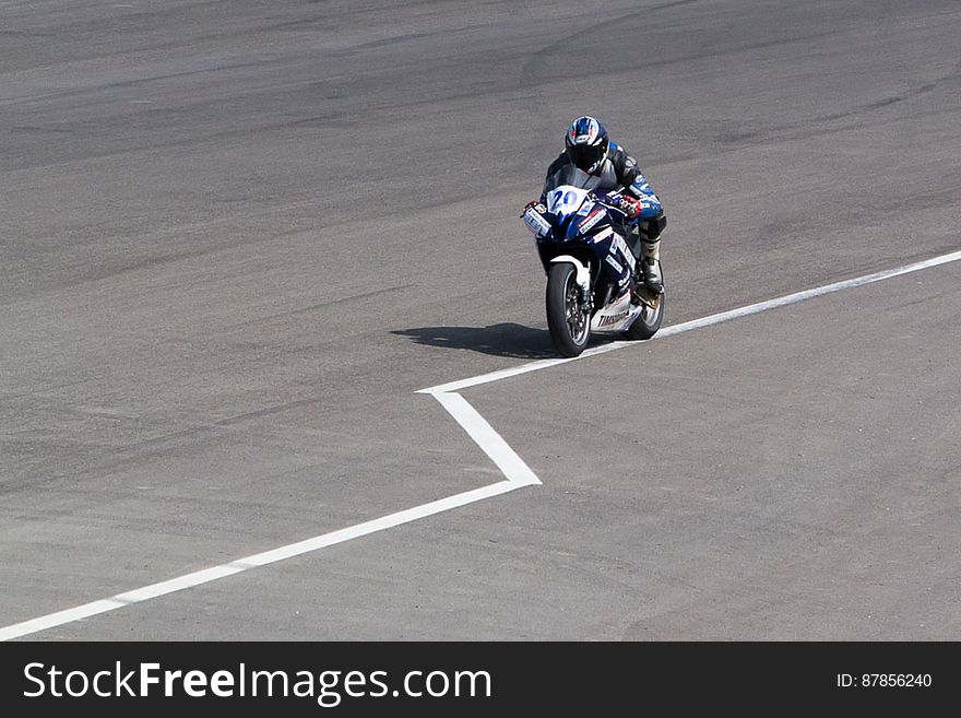 Yamaha 600 cc motorbike running on race circuit. Yamaha 600 cc motorbike running on race circuit