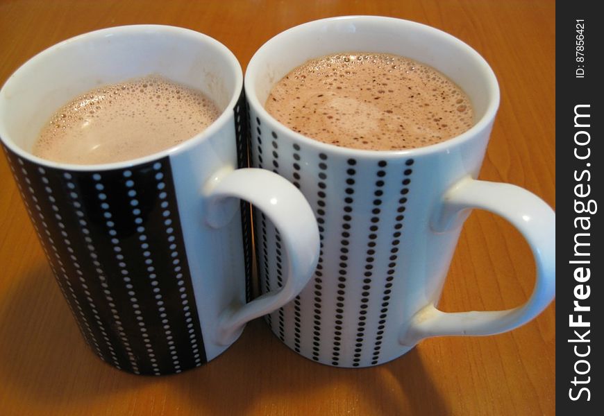 pair-of-dotted-mugs-with-chocolate