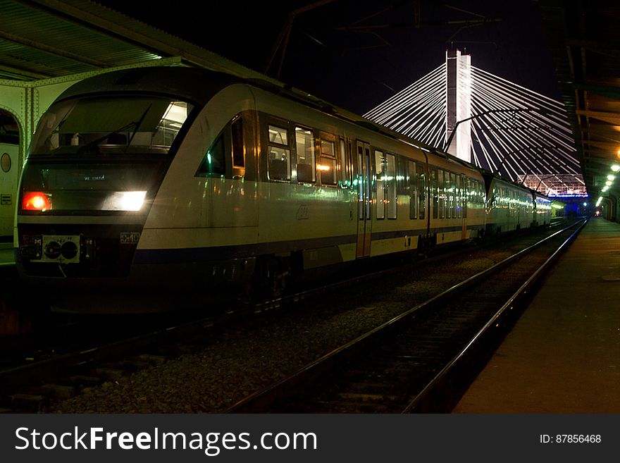 Blue Arrow Romanian train parked at Gara de Nord station. Basarab overpass is seen in the background.