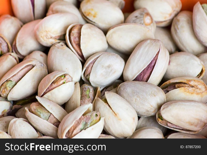 Roasted and salted pistachios in shell. They have a high content in saturated fats, proteins and fibers and are proven to reduce heart diseases. Roasted and salted pistachios in shell. They have a high content in saturated fats, proteins and fibers and are proven to reduce heart diseases.