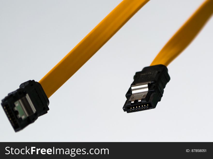 Yellow SATA cables used to transfer data to mass storage devices like optical drives and hard drives.