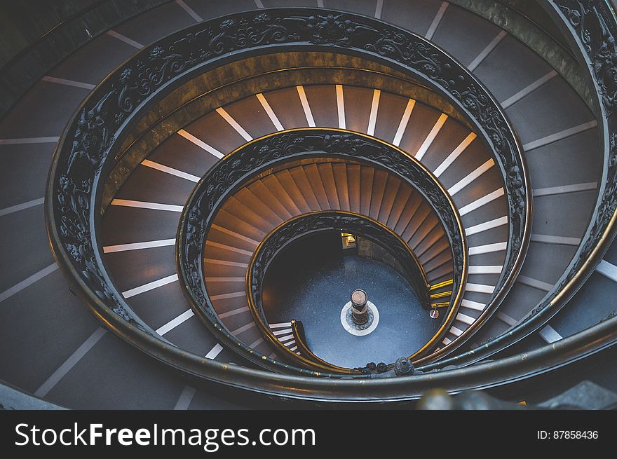 A spiraling staircase seen from above. A spiraling staircase seen from above.