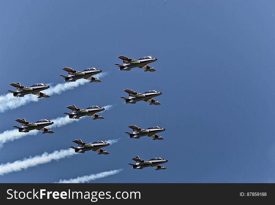 Frecce Tricolori flying in close wedge formation. Frecce Tricolori flying in close wedge formation.