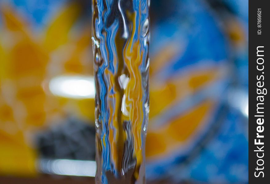 water-flow-by-blue-and-yellow-tile
