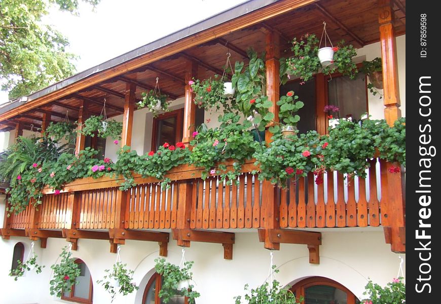 wooden-veranda-with-flower-pots