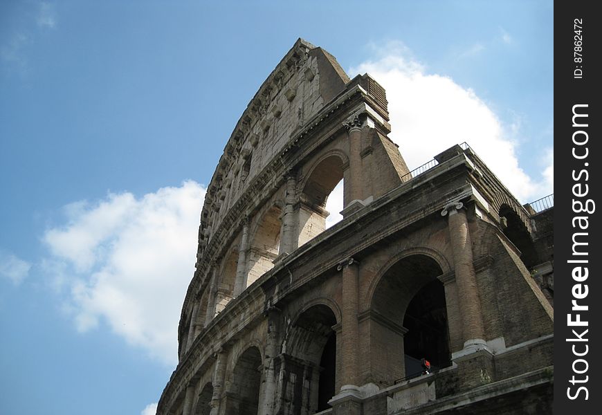 broken-wall-of-the-colloseum-against-clouds