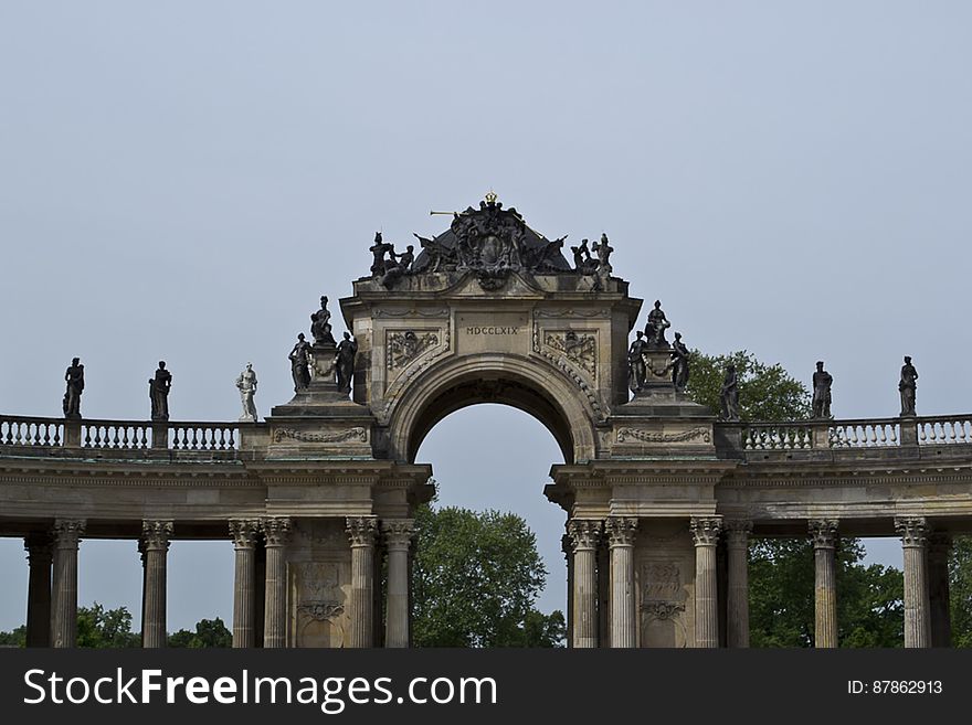 Decorative collonade with statuary, joining the two corps of the Communs in Potsdam. Decorative collonade with statuary, joining the two corps of the Communs in Potsdam.