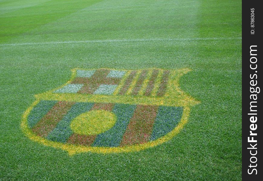 fc-barcelona-emblem-on-stadium-turf