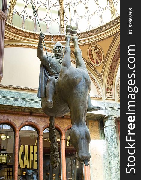 Controversial work of art representing Bohemian King Wenceslas riding a dead hose. The statue hangs from the ceiling of Lucerna Passage, close to Wenceslas squa. Controversial work of art representing Bohemian King Wenceslas riding a dead hose. The statue hangs from the ceiling of Lucerna Passage, close to Wenceslas squa