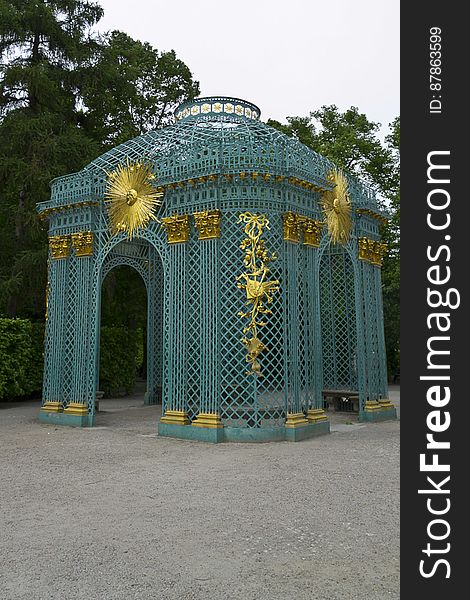 Trellised gazebo with gilded sun motifs ornaments by Sanssouci Palace. Trellised gazebo with gilded sun motifs ornaments by Sanssouci Palace.