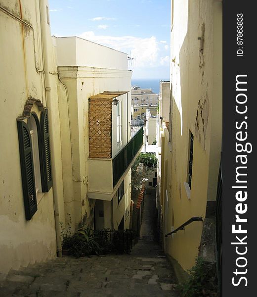 Steps on slanty narrow street
