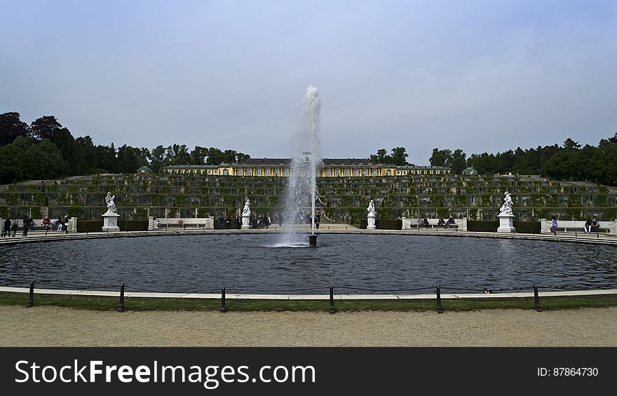 View of Great Fountain surrounded by marble statues in front of the six terraces leading up to Sanssouci Palace. View of Great Fountain surrounded by marble statues in front of the six terraces leading up to Sanssouci Palace.