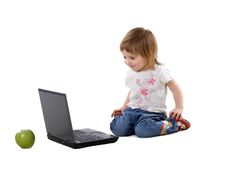 Cute Little Girl And Laptop Royalty Free Stock Photography