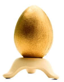 One Golden Egg On A Stand Royalty Free Stock Photos One Golden Egg On A Stand Royalty Free Stock Photos